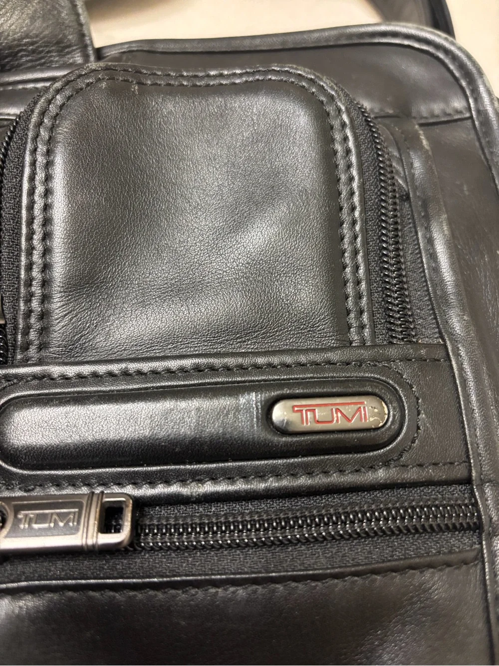 Tumi Alpha Leather Messenger and Laptop Bag